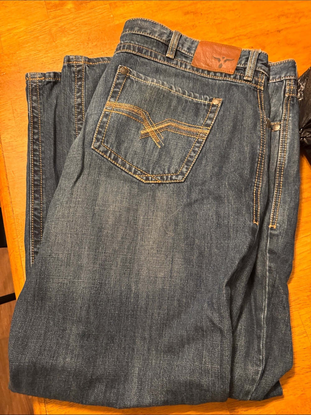 Men's wrangler 20x. 42x32  Blue Denim Jeans - Leather Patch Waistband
